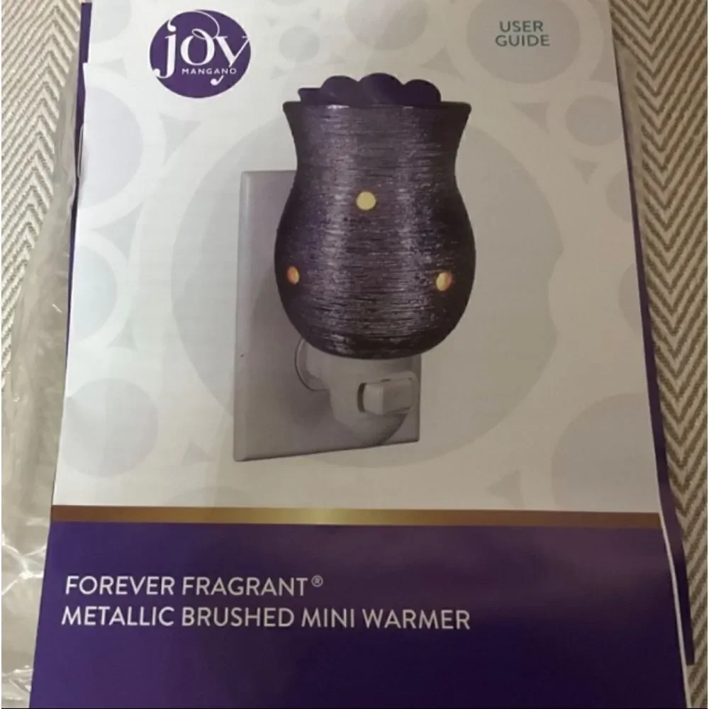 Joy Mangano Forever Fragrant wax warmers with  vanilla bean  heart melts